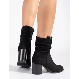Women's black suede boots on the post 1
