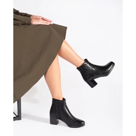 Black high-heeled ankle boots by Sergio Leone 1