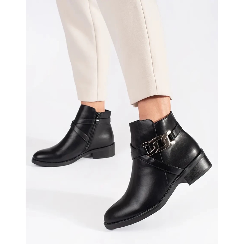 Black Chelsea boots with a flat heel and a decorative strap 1 Black Chelsea boots with a flat heel and a decorative strap 1