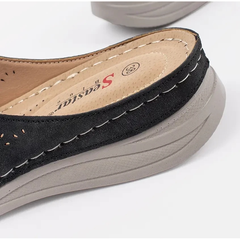 Black women's slippers on a thick sole 1 Black women's slippers on a thick sole 1