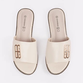 Goodin Light -beige women's flaps on a flat sole with an ornament 2 Goodin Light -beige women's flaps on a flat sole with an ornament 2