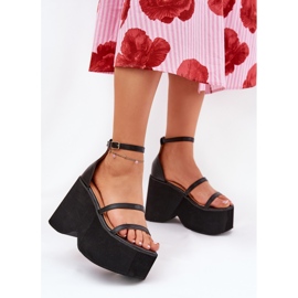 Women's sandals on a massive platform and black wedges 2