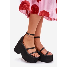 Women's sandals on a massive platform and black wedges 1