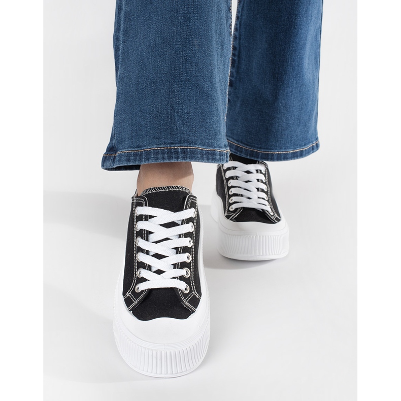 Black and white sneakers with a thick sole 2 Black and white sneakers with a thick sole 2