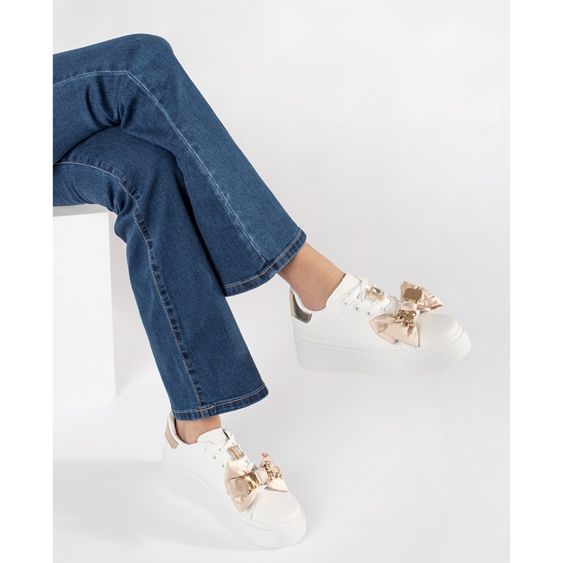 White and gold sneakers with golden additions 1