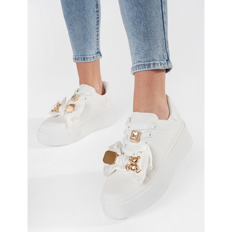 White sneakers with golden additions 1