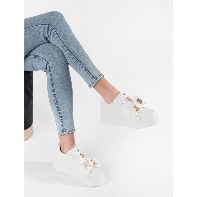 White sneakers with golden additions 2