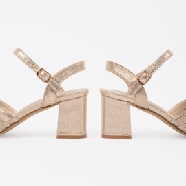 Goodin Gold shiny sandals on the post golden 1