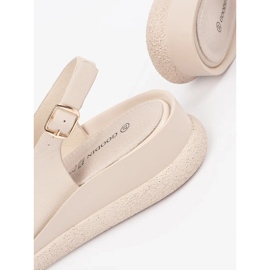 Goodin Beige flat sandals with an ornament 1