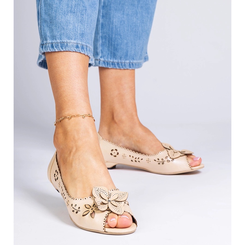 Beige openwork ballerinas with an open toe 1