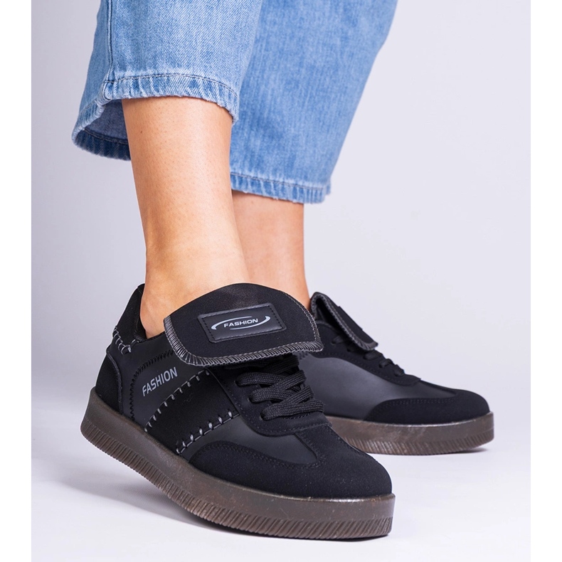 Black platform sneakers with stitching 1