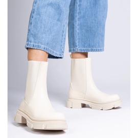 Beige ankle boots with a flexible upper 1 Beige ankle boots with a flexible upper 1