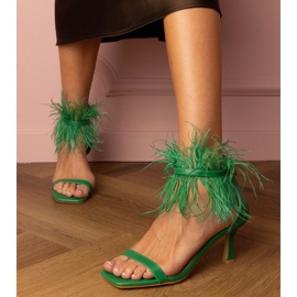 Green sandals on a pin with feathers 1