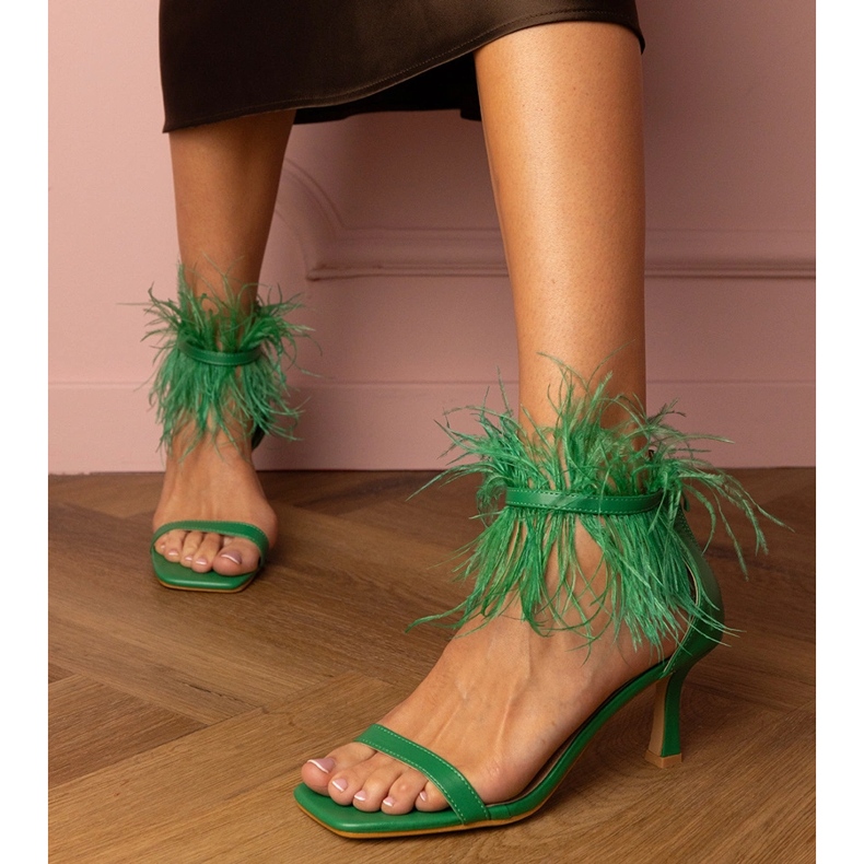 Green sandals on a pin with feathers 1
