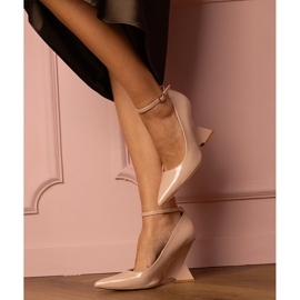 Beige patent leather wedge pumps 1