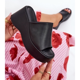 Eco leather women's slippers on the platform and black wedges 1