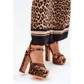 Women's sandals on a high post and a brown leopard print platform 2
