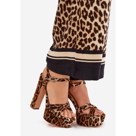 Women's sandals on a high post and a brown leopard print platform 1