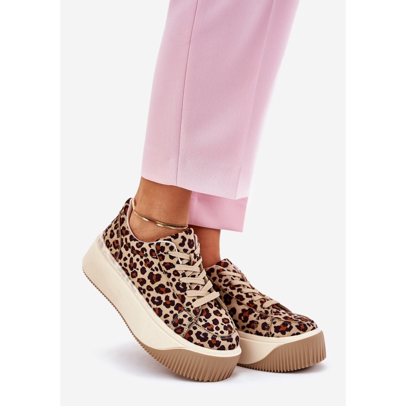 Sneakers on a massive brown leopard platform 1