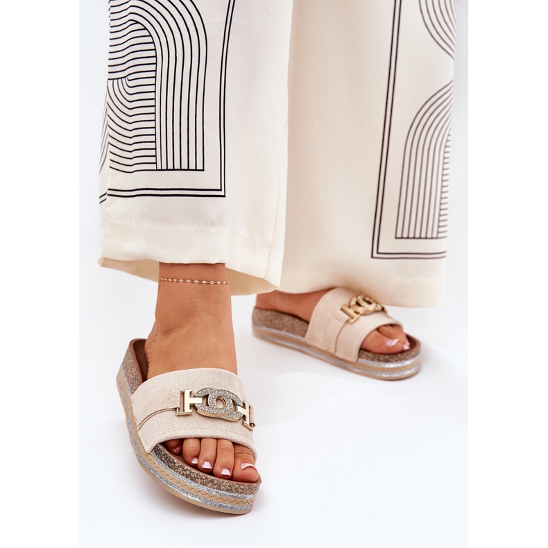 Women's flip flops with a golden detail on the platform with glitter beige 2
