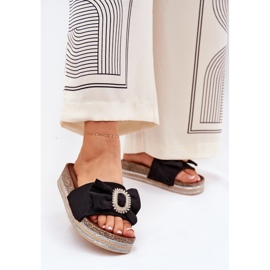 Women's flip flops on the platform with a bow and a decorative brooch black 2