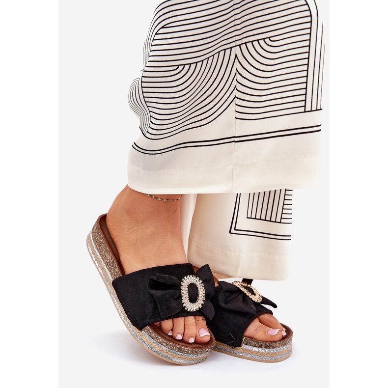 Women's flip flops on the platform with a bow and a decorative brooch black 1