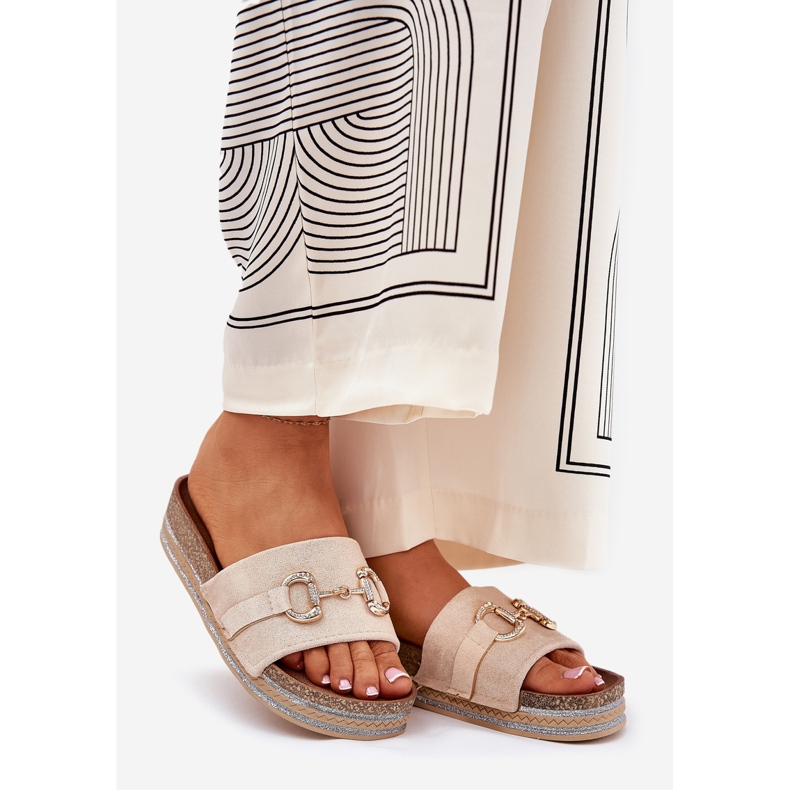 Women's flip flops on the platform with a golden ornament and beige glitter 1