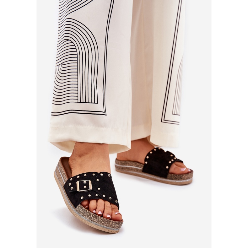 Women's slippers on the platform with a buckle and black studs 1
