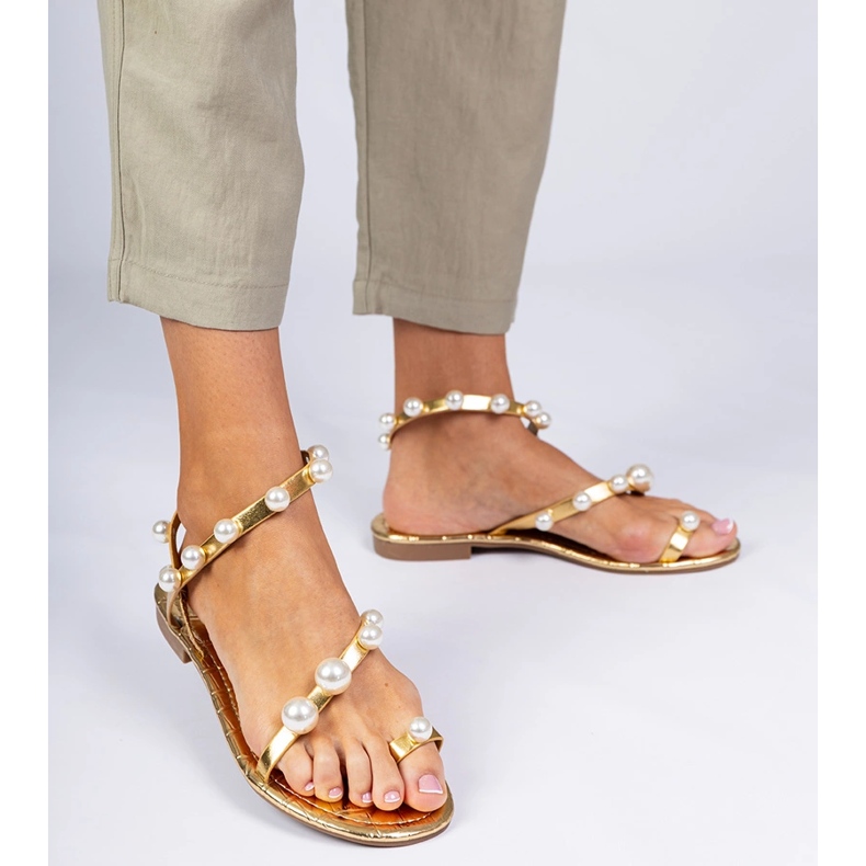 Golden women's sandals decorated with pearls 1 Golden women's sandals decorated with pearls 1