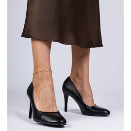 Black classic pumps on a high heel 1