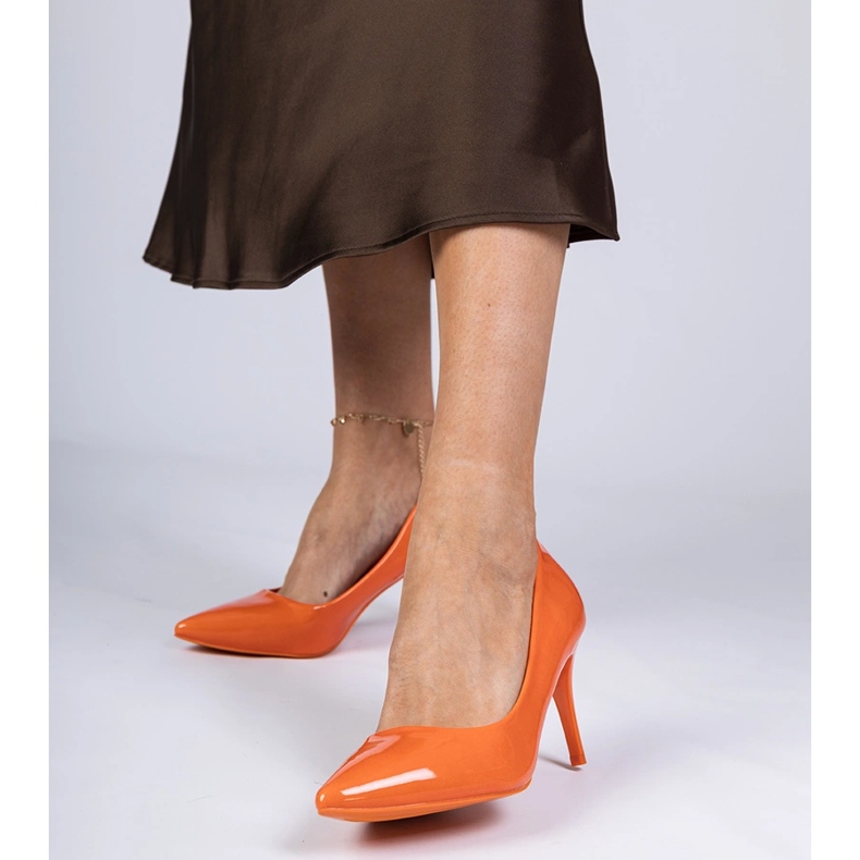 Orange varnished pumps on a high heel 1