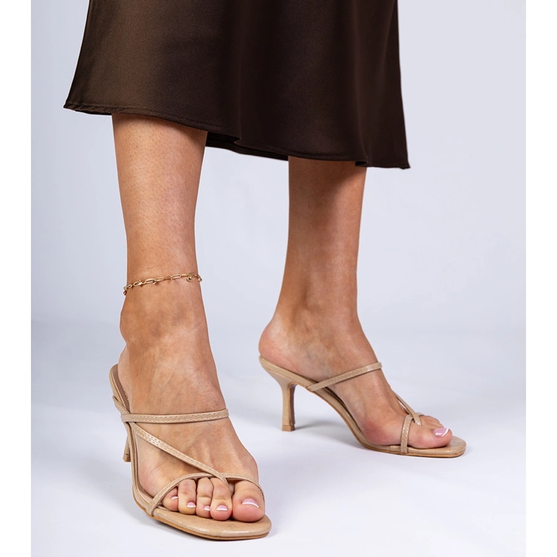 Beige elegant flip flops on a high heel 1