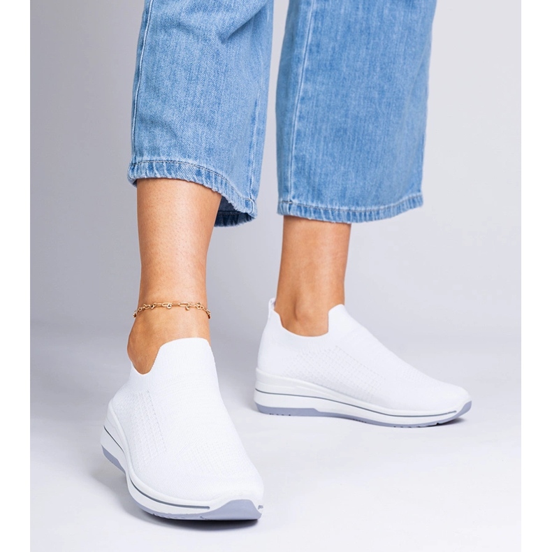 White slip-on sports sneakers 1