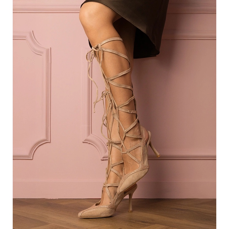 Beige sandals on a high heel tied with zircons 1