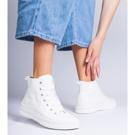 White high platform sneakers by Guerrino 2