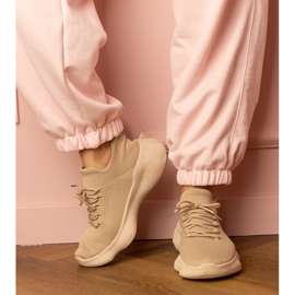 Beige sports sneakers with a socks upper 2