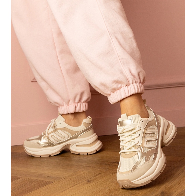 Beige sports sneakers on a massive sole 2 Beige sports sneakers on a massive sole 2