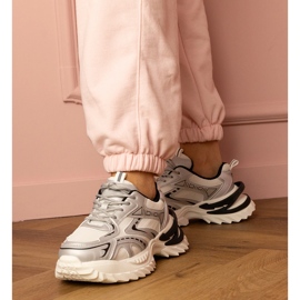 Silver sports sneakers on a thick sole 1