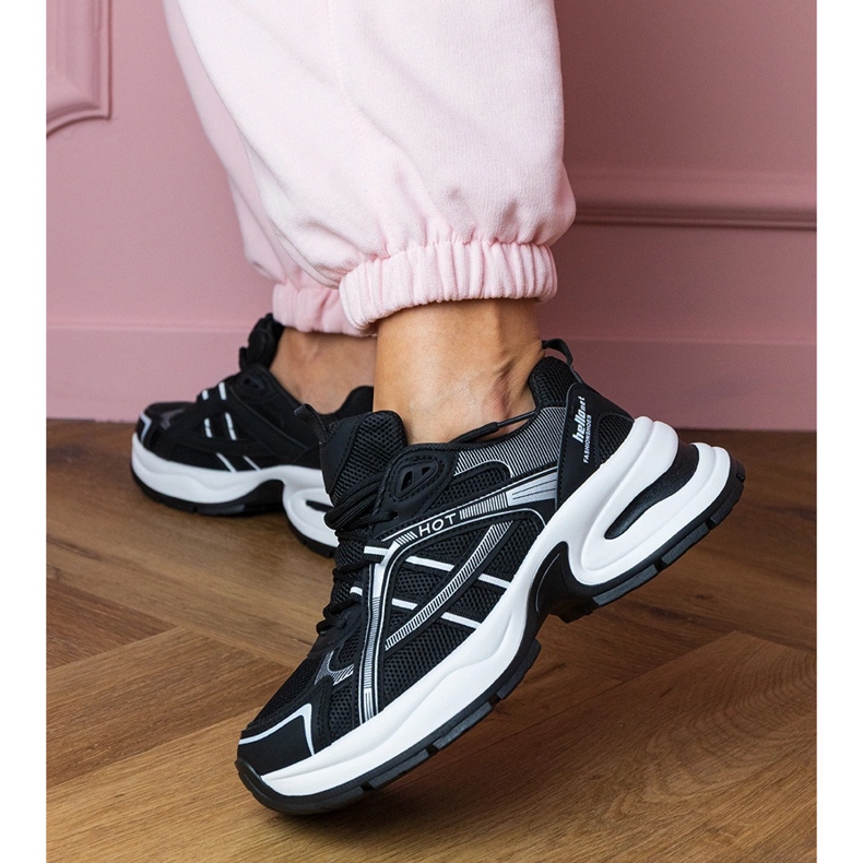 Black sports sneakers on a massive sole 1