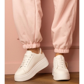 White sneakers with a golden heart and a zircon pins 1