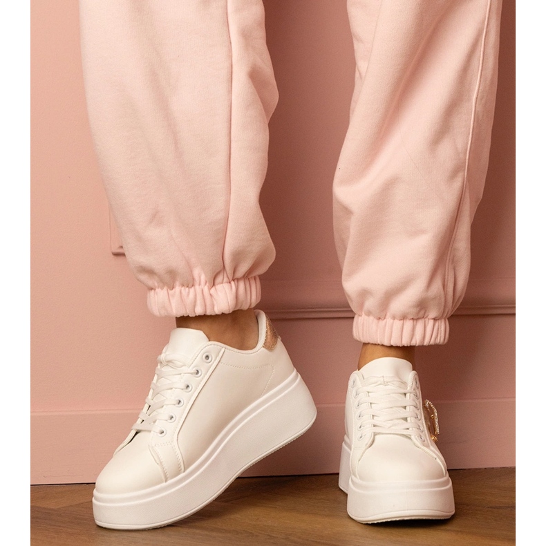 White sneakers with a golden heart and a zircon pins 1