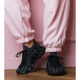 Black sports sneakers on a massive sole 1