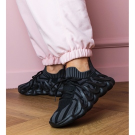 Black sports sneakers on a massive sole 2