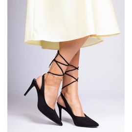 Black high heels with an open heel 1