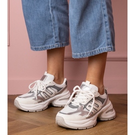 White sports sneakers with a massive sole 1 White sports sneakers with a massive sole 1