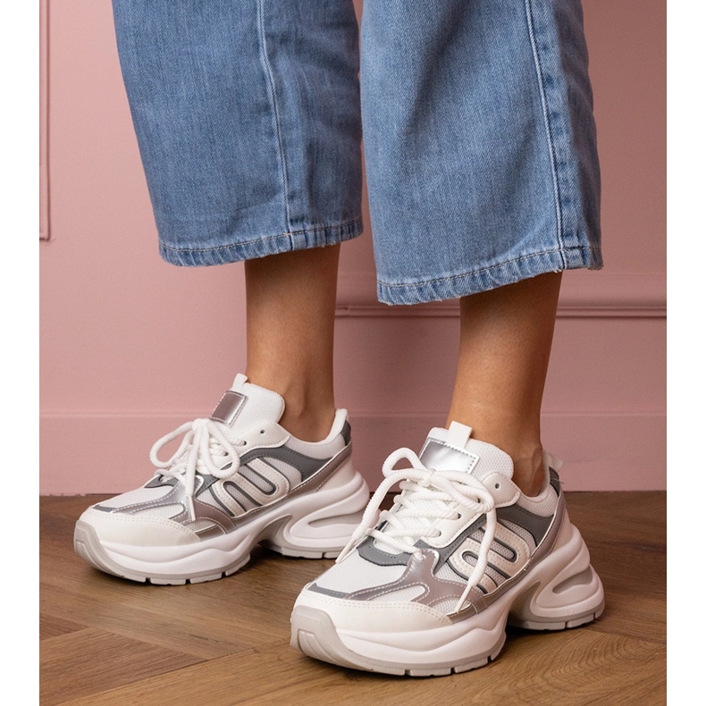 White sports sneakers with a massive sole 1 White sports sneakers with a massive sole 1