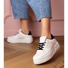 Beige sports sneakers on platfotm 1