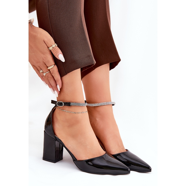 Painted pumps with pointed toes on the black post 2