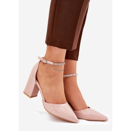 Painted pumps with pointed toes on the post beige 1