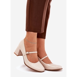 Painted pumps on the post with a belt and buckle beige 1